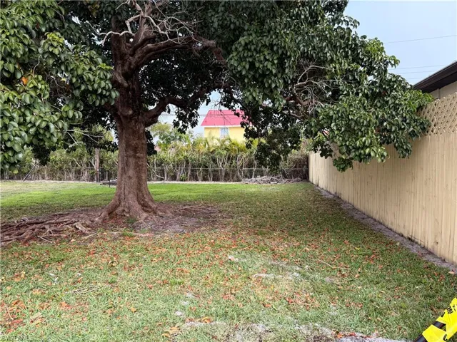 View of fenced backyard