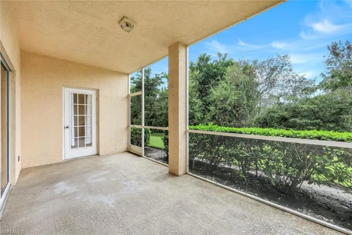Door from Primary Bedroom leads to screened patio.