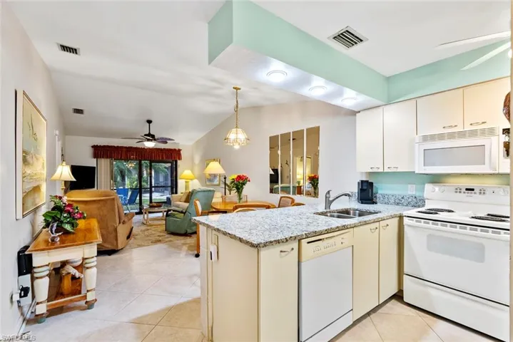 Granite counters. Breakfast bar.