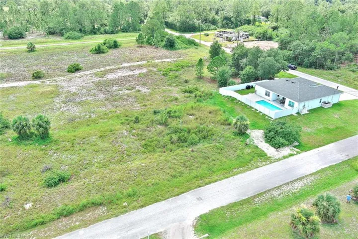 View from above of property with a pool area