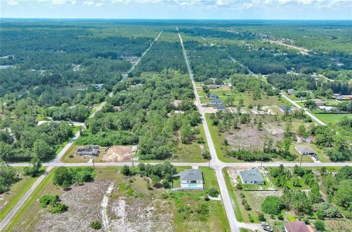 View of property location with a forest