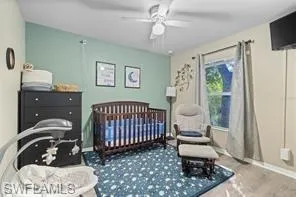 Bedroom with baseboards