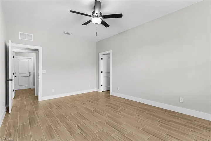Full bathroom with a shower stall and vanity