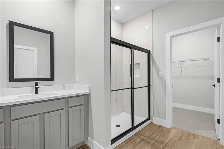 Spare room with wood tiled floors and baseboards