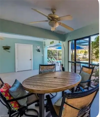 Dining area featuring a ceiling fan