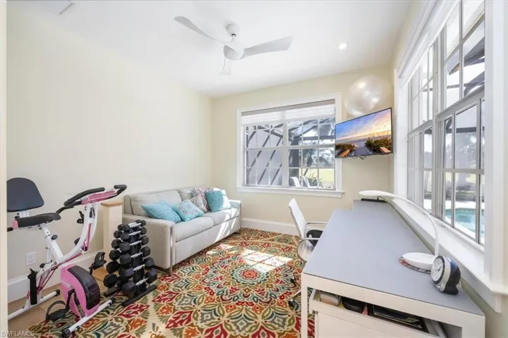 Office featuring ceiling fan and a wealth of natural light
