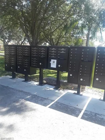 View of home's community with mail boxes