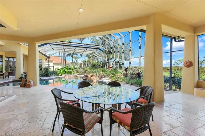 View of patio / terrace featuring glass enclosure