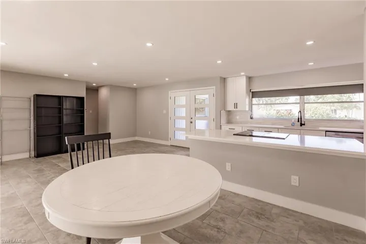 Dining room featuring recessed lighting and french doors