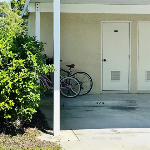 Property entrance with stucco siding