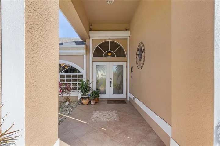 Entrance to property featuring french doors