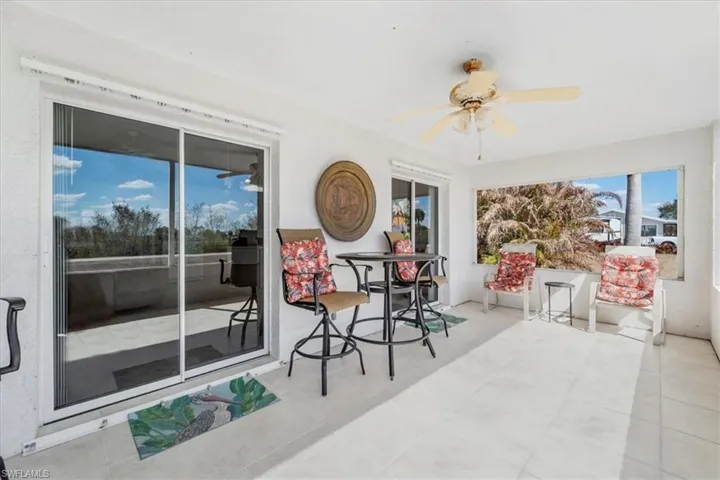 Front screened lanai south facing towards the river.