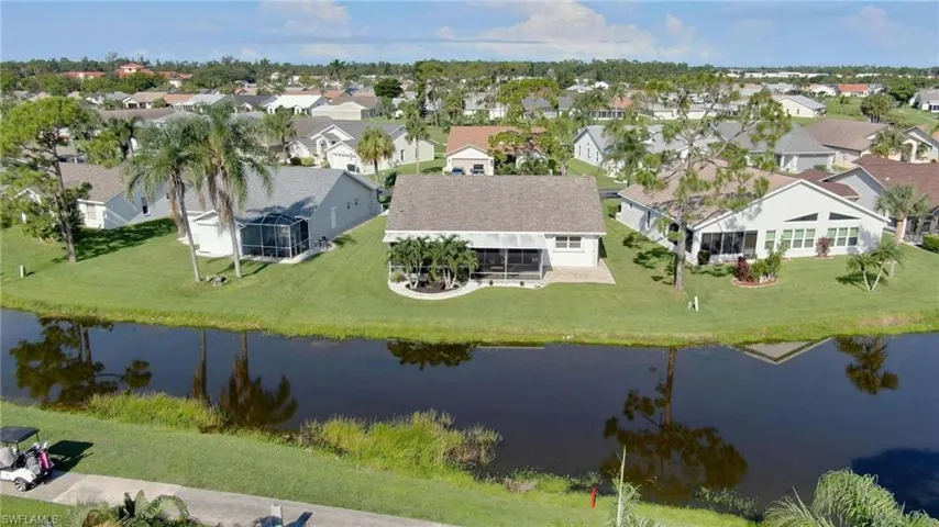 Aerial view of residential area with a large body of water