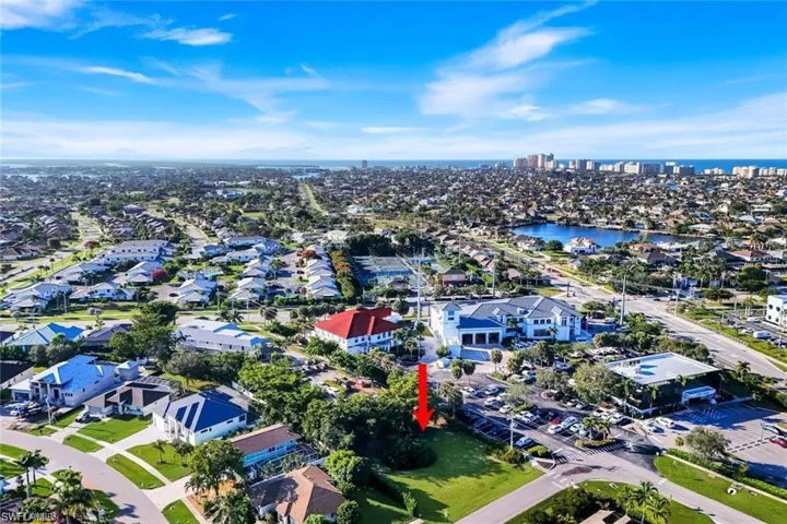 View of urban area featuring a nearby body of water and nearby suburban area