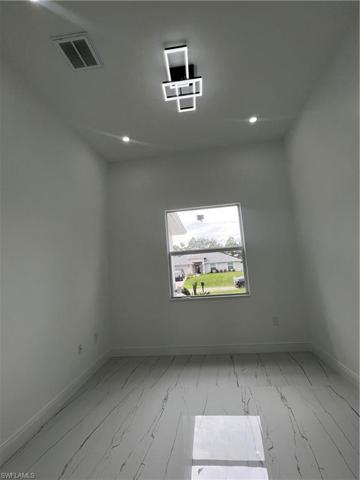 313 LLoyd AVE, LEHIGH ACRES FL 33974