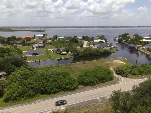 Aerial View of Lot with the Peace River beyond the next block