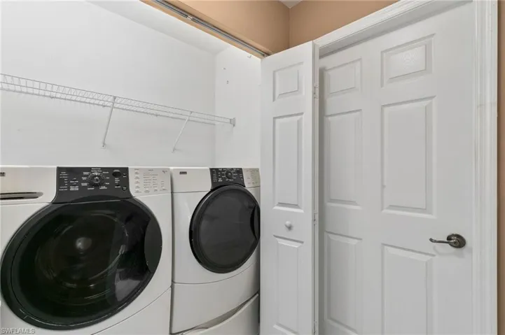 Laundry room with washing machine and dryer
