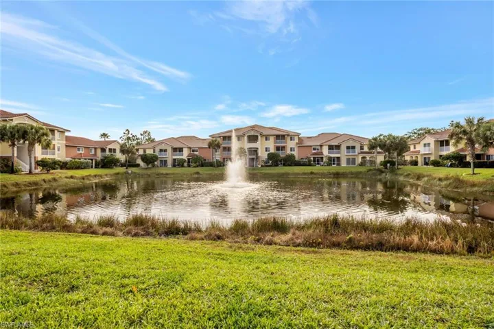 Water view featuring nearby suburban area