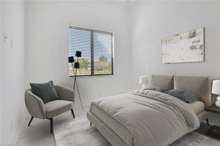 Bedroom featuring baseboards
