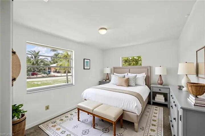 Bedroom featuring terrazzo flooring