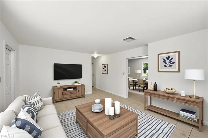 Living room featuring tile flooring