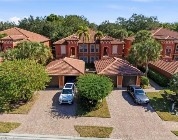 Mediterranean / spanish-style home with a tiled roof