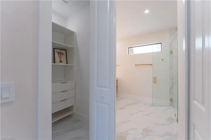 Bathroom featuring an enclosed shower