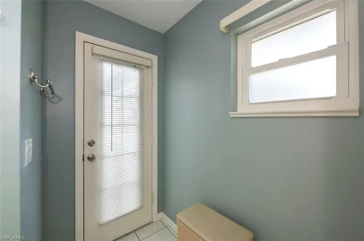 guest bathroom door to pool
