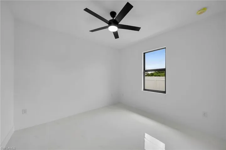 Unfurnished room with ceiling fan