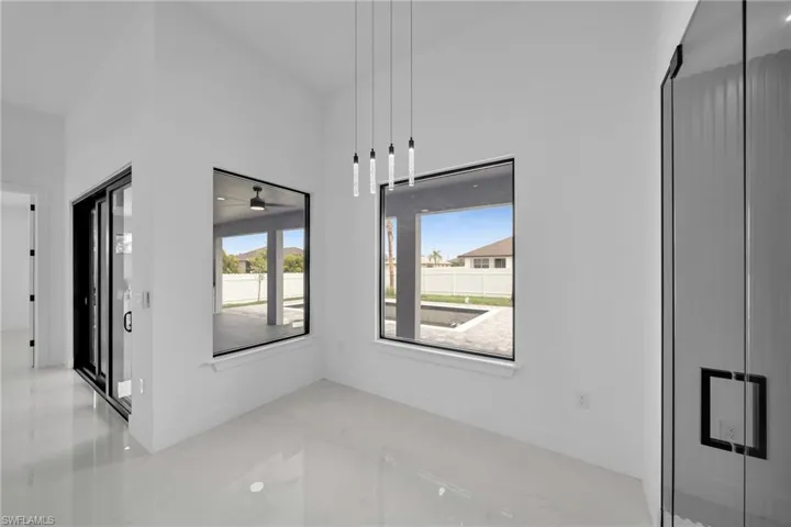 Empty room featuring ceiling fan