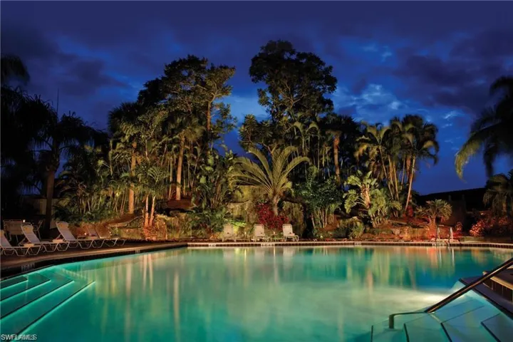 View of pool at twilight