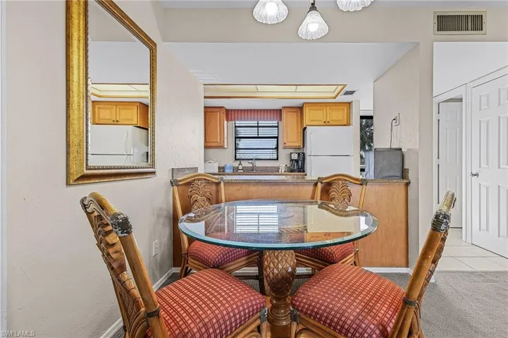View of carpeted dining space