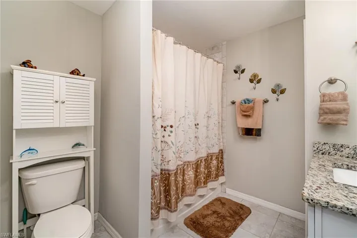 Guest bathroom with a tub & shower.