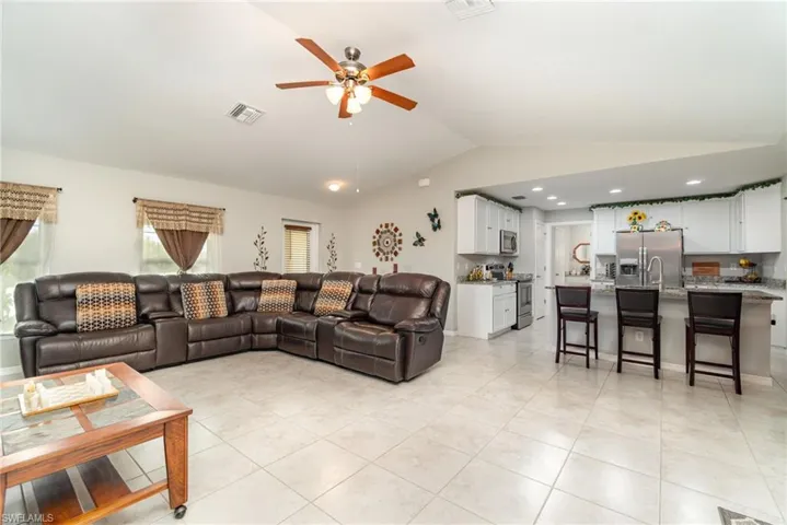 View of the living room and kitchen.