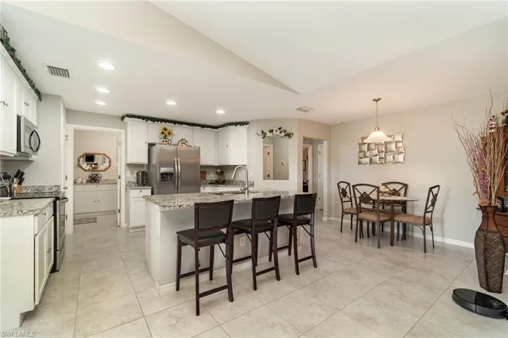 Open kitchen with a pantry.