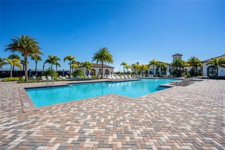 Community pool with a patio area