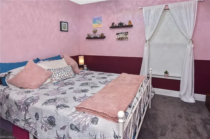 Bedroom with carpet
