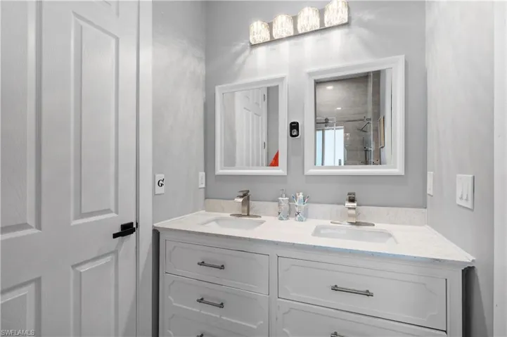 Bathroom featuring double vanity