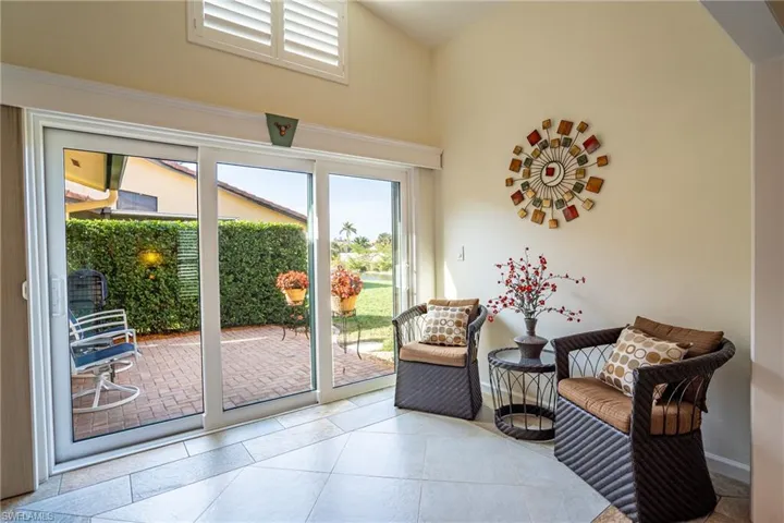Living area with hurricane sliding doors