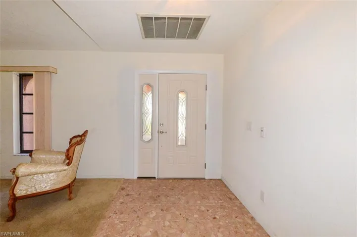 Foyer entrance featuring plenty of natural light
