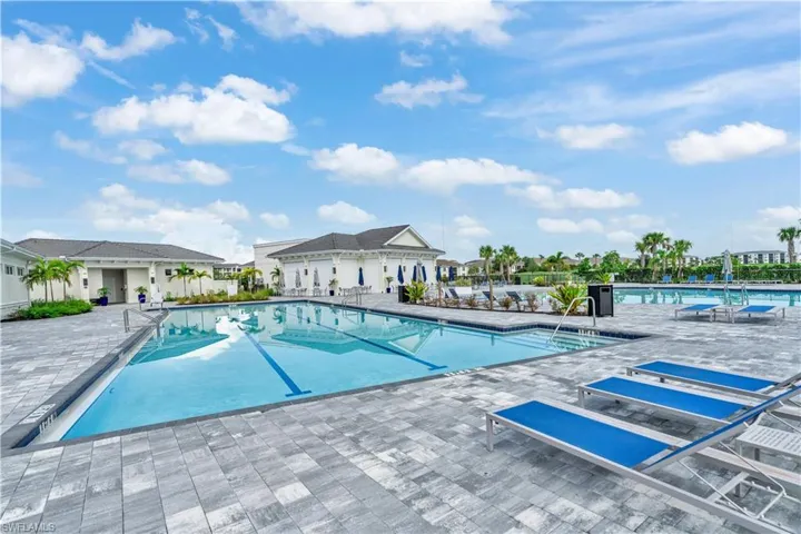 Community pool with a patio area