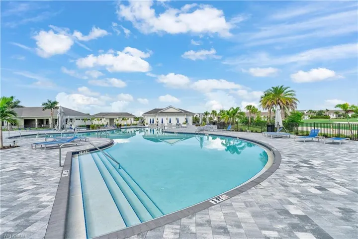 Community pool featuring a patio area