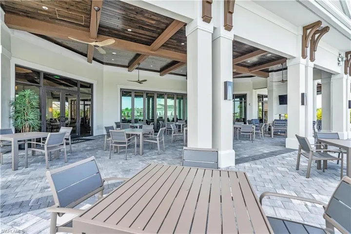View of patio / terrace featuring outdoor dining space and ceiling fan