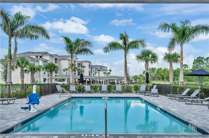 Community pool with a patio area