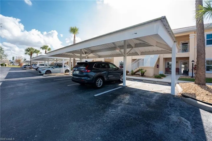 View of parking with a carport - spot RHS