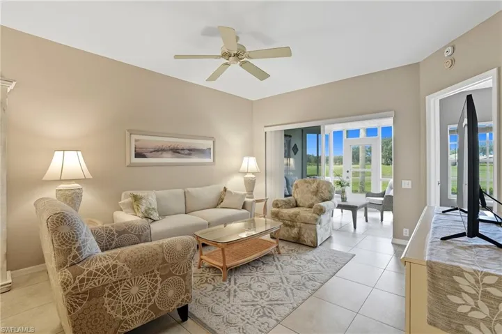 Neutral tone wall finish with a ceiling fan overhead