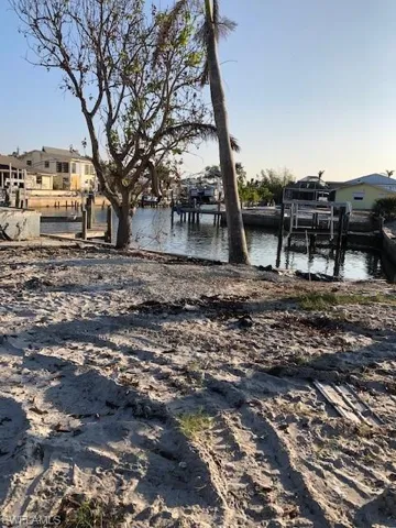 Dock featuring a water view and boat lift