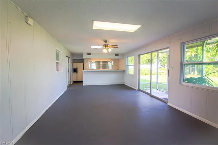 Air Conditioned Family Room/Lanai with bar.