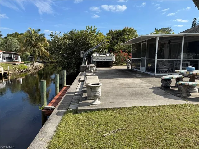 View of dock and sewall with wooden dock