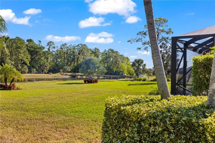 View of yard featuring a rural view and a lanai